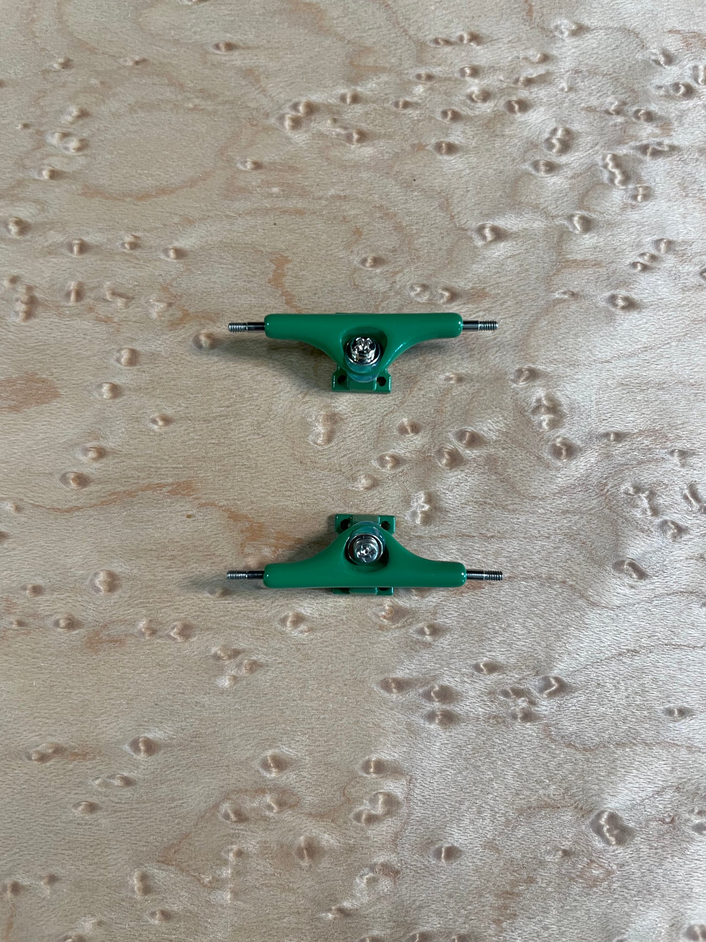 Green inverted kingpin trucks