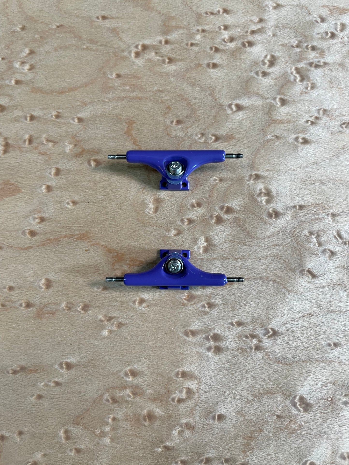 Purple inverted kingpin trucks