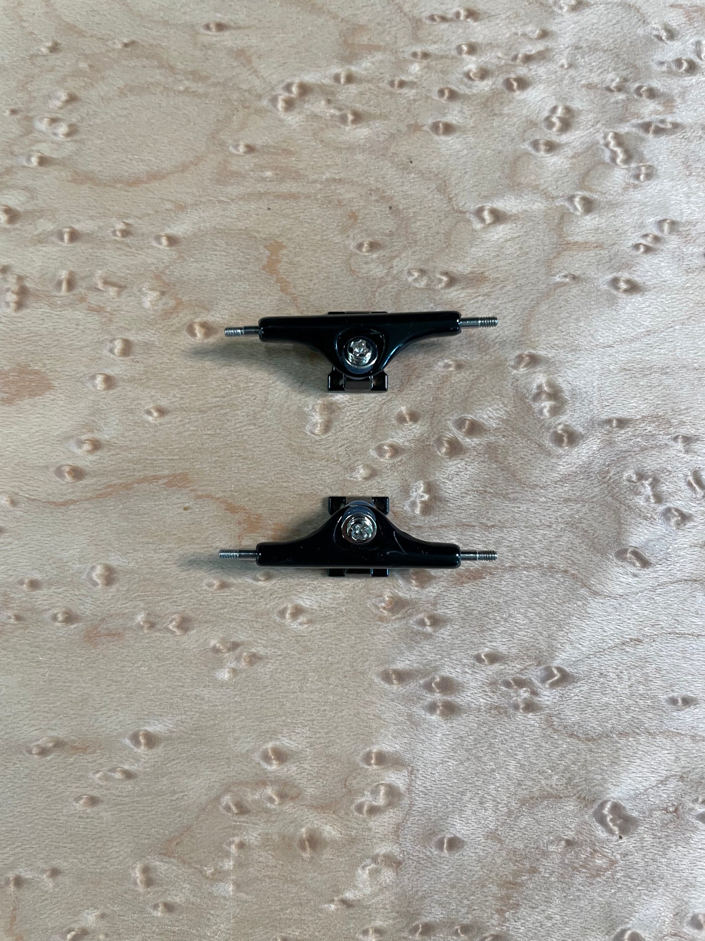 Black inverted kingpin trucks