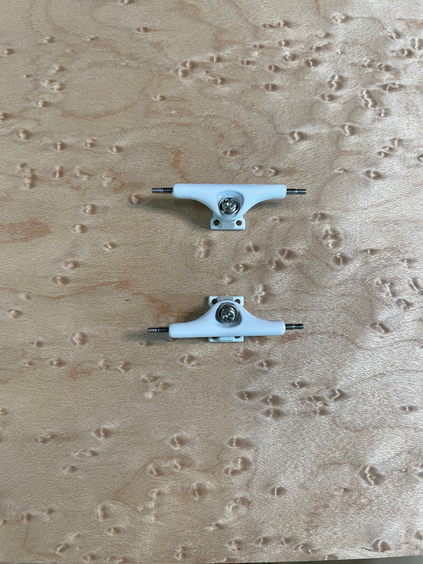White inverted kingpin trucks