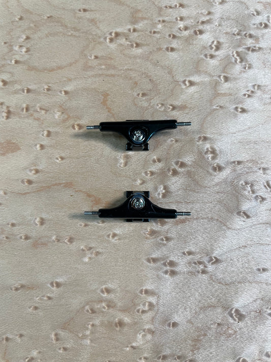Black inverted kingpin trucks