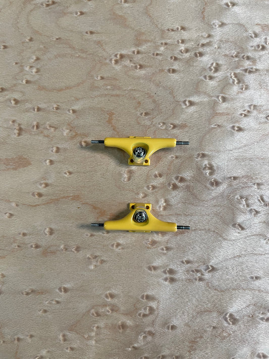 Yellow inverted kingpin trucks
